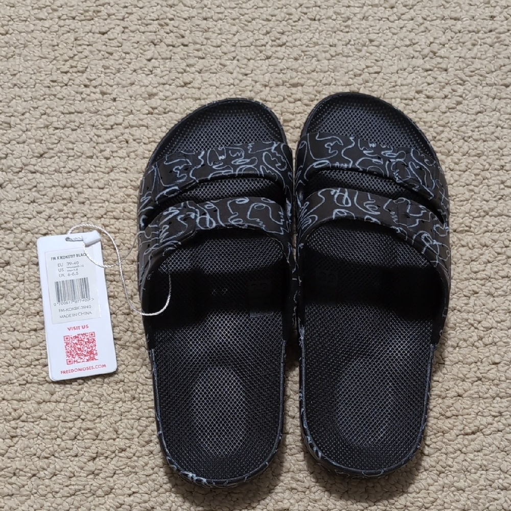 Freedom Moses Black Slide Sandals with White Pattern